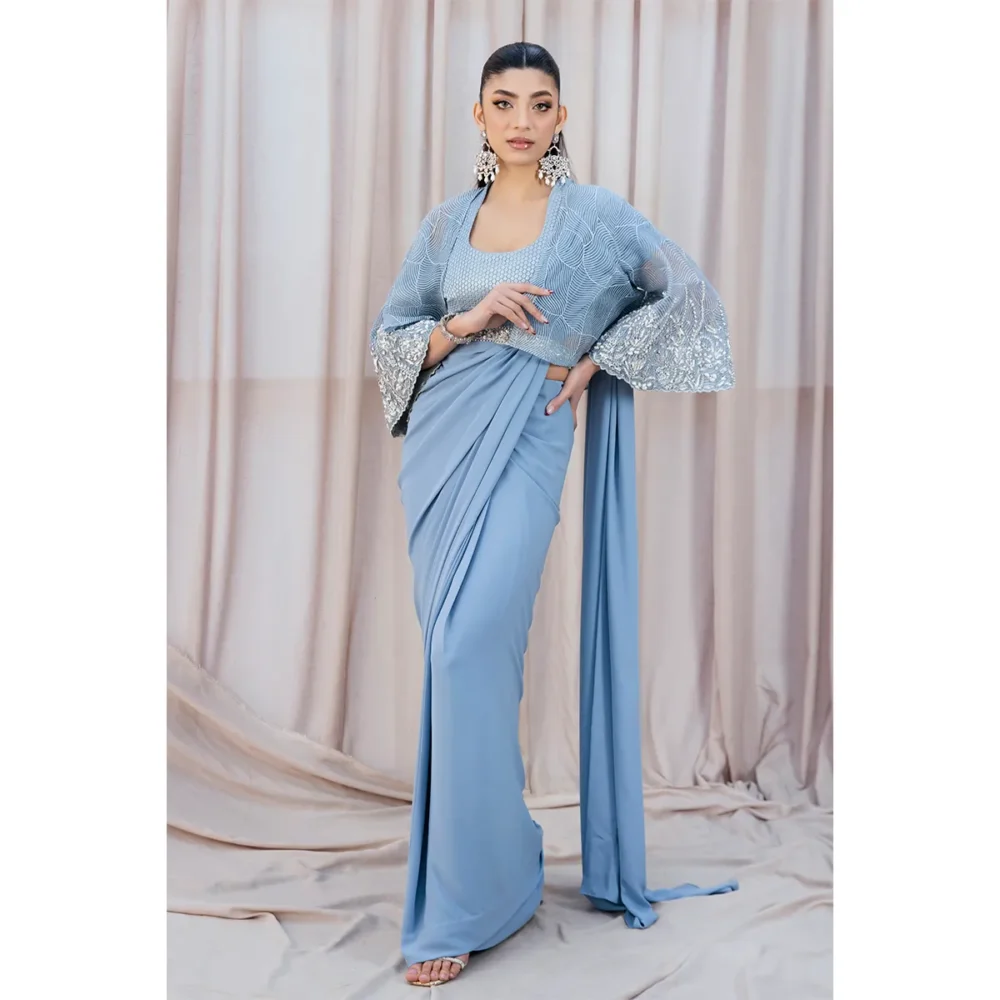 Full Outfit Image "Sky Blue Fusion Saree with organza cape, modern belt, and hand-embellished details, perfect for weddings and formal events."