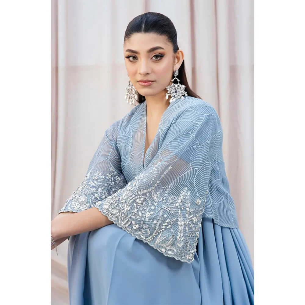 Fabric Detail "Close-up of double crepe fabric, offering luxurious structure and comfort in the Sky Blue Fusion Saree."