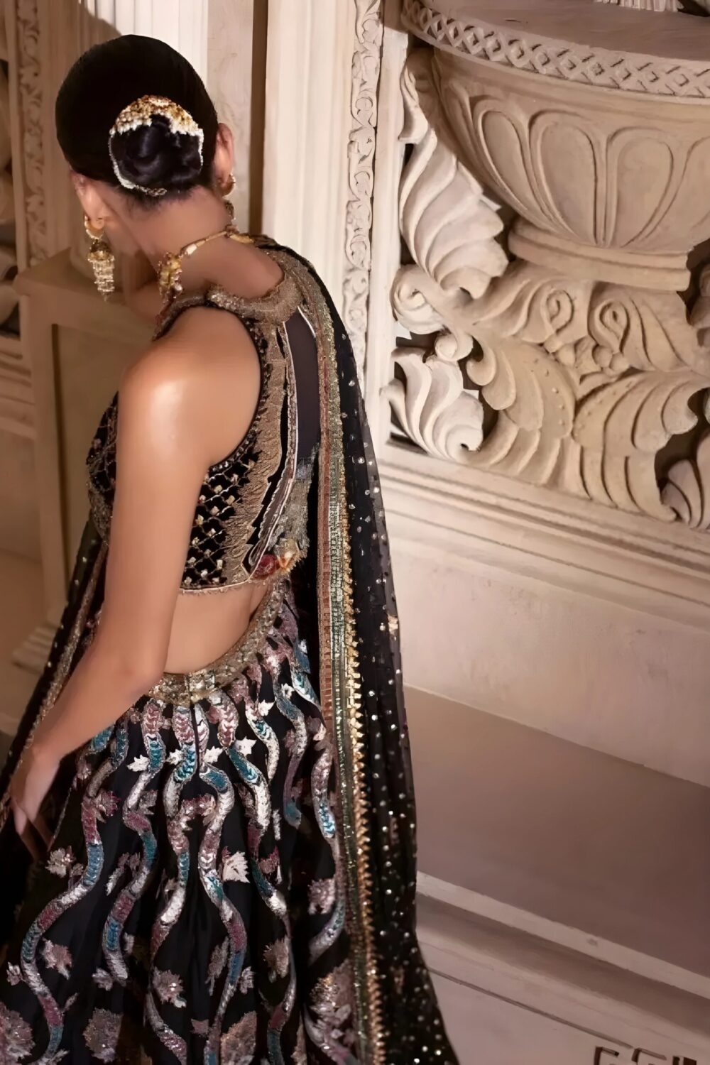 Black Lehenga Choli – with Gold Embroidery and Emerald Stone