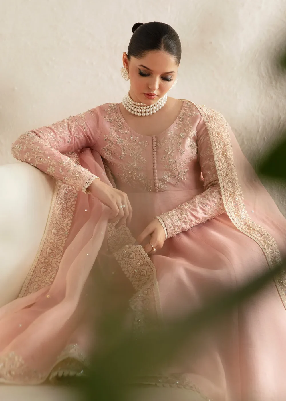 "Blush pink pishwas with intricate embroidery and hand embellishments"