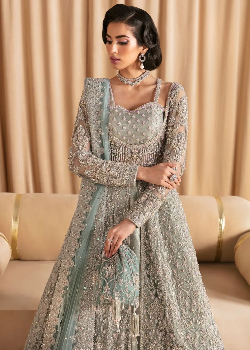 Light Blue Pishwas with Lehenga, showcasing intricate design and voluminous lehenga"