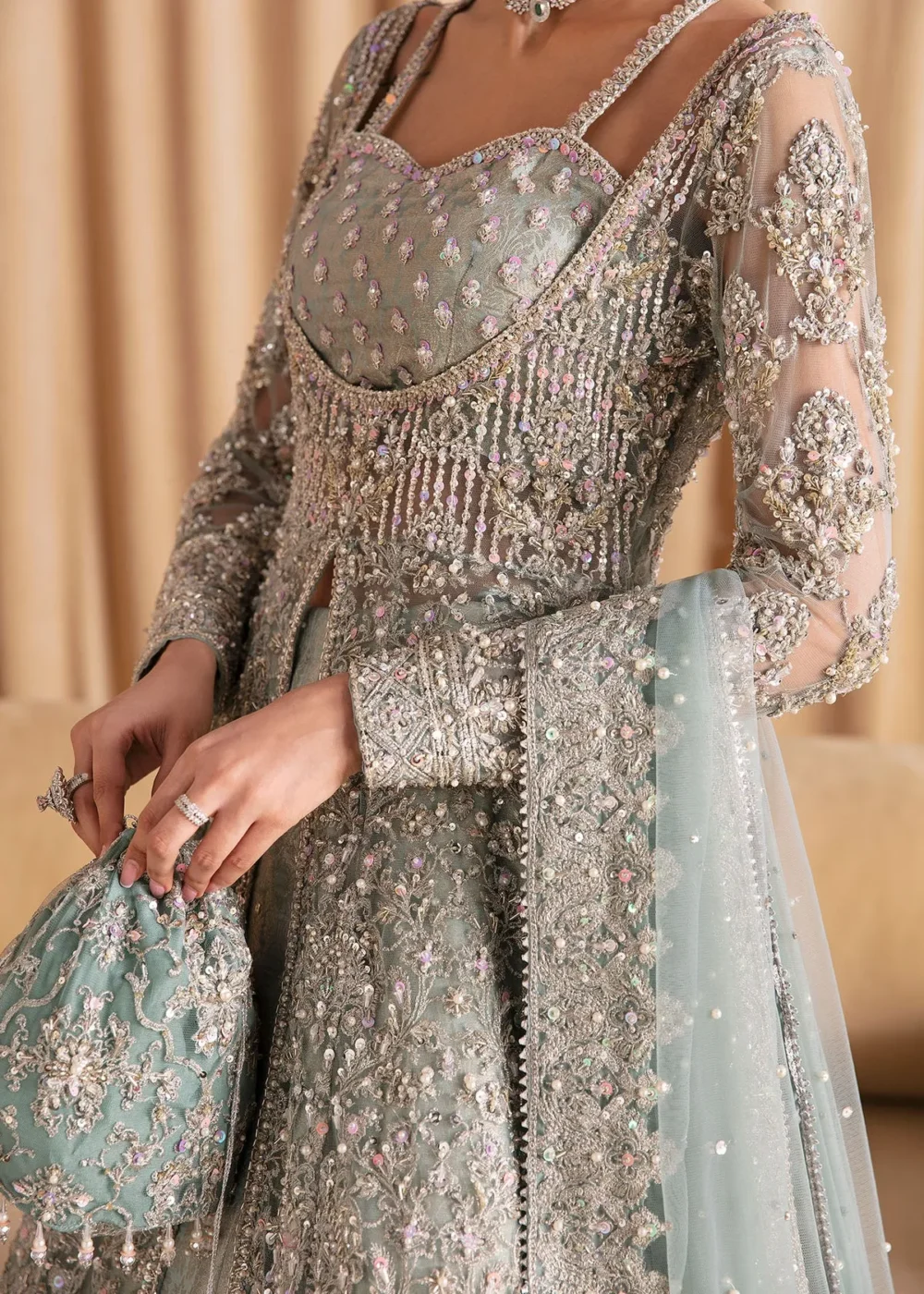 Light Blue Pishwas with Lehenga, showcasing intricate design and voluminous lehenga"