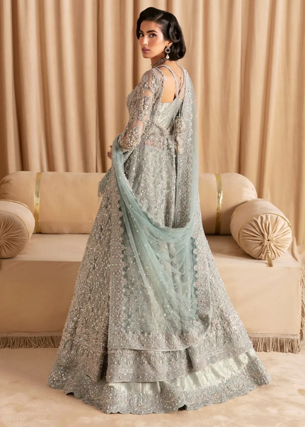 Light Blue Pishwas with Lehenga, showcasing intricate design and voluminous lehenga"