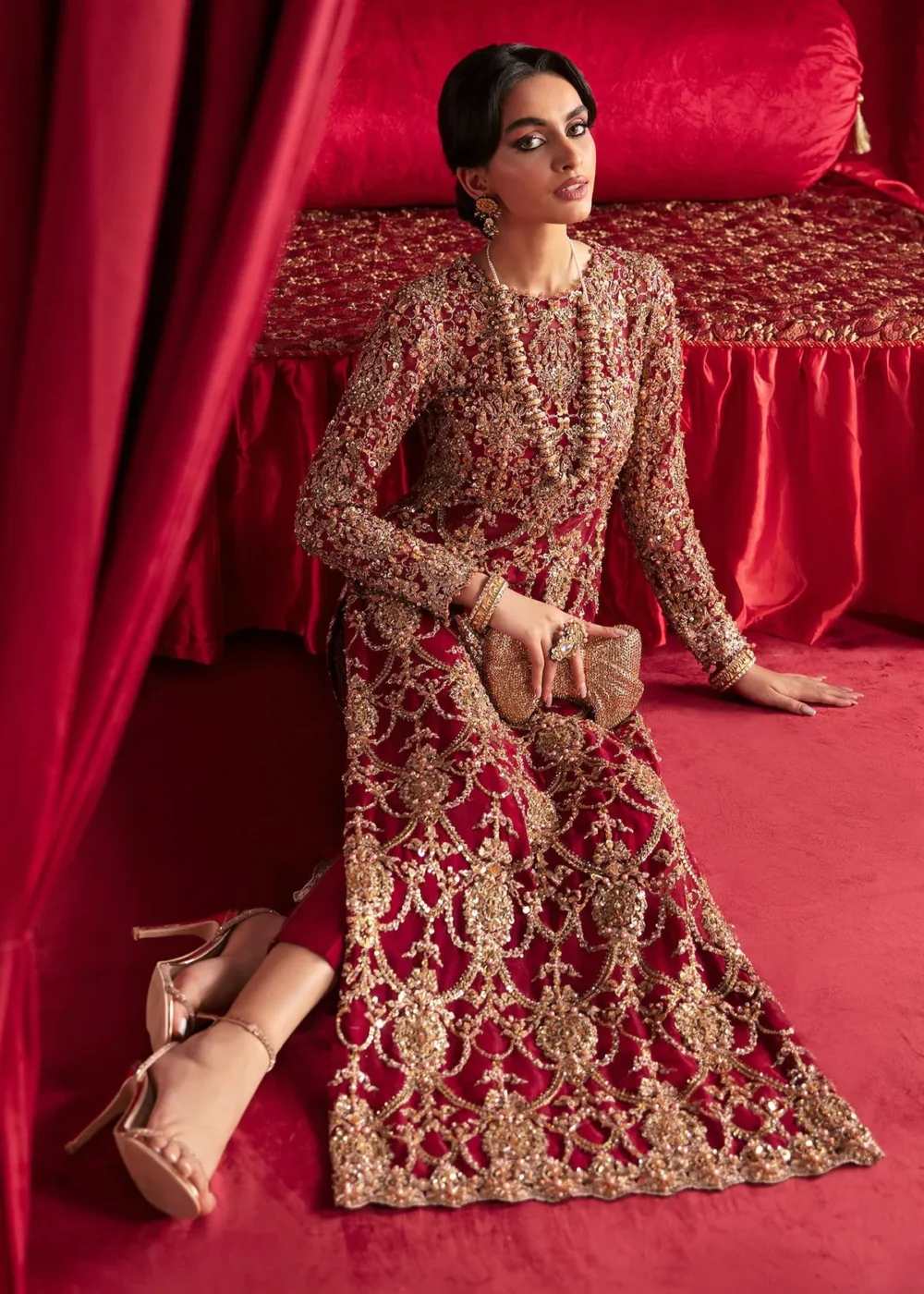 "Berry red organza long dress with intricate embellishments and sequins"