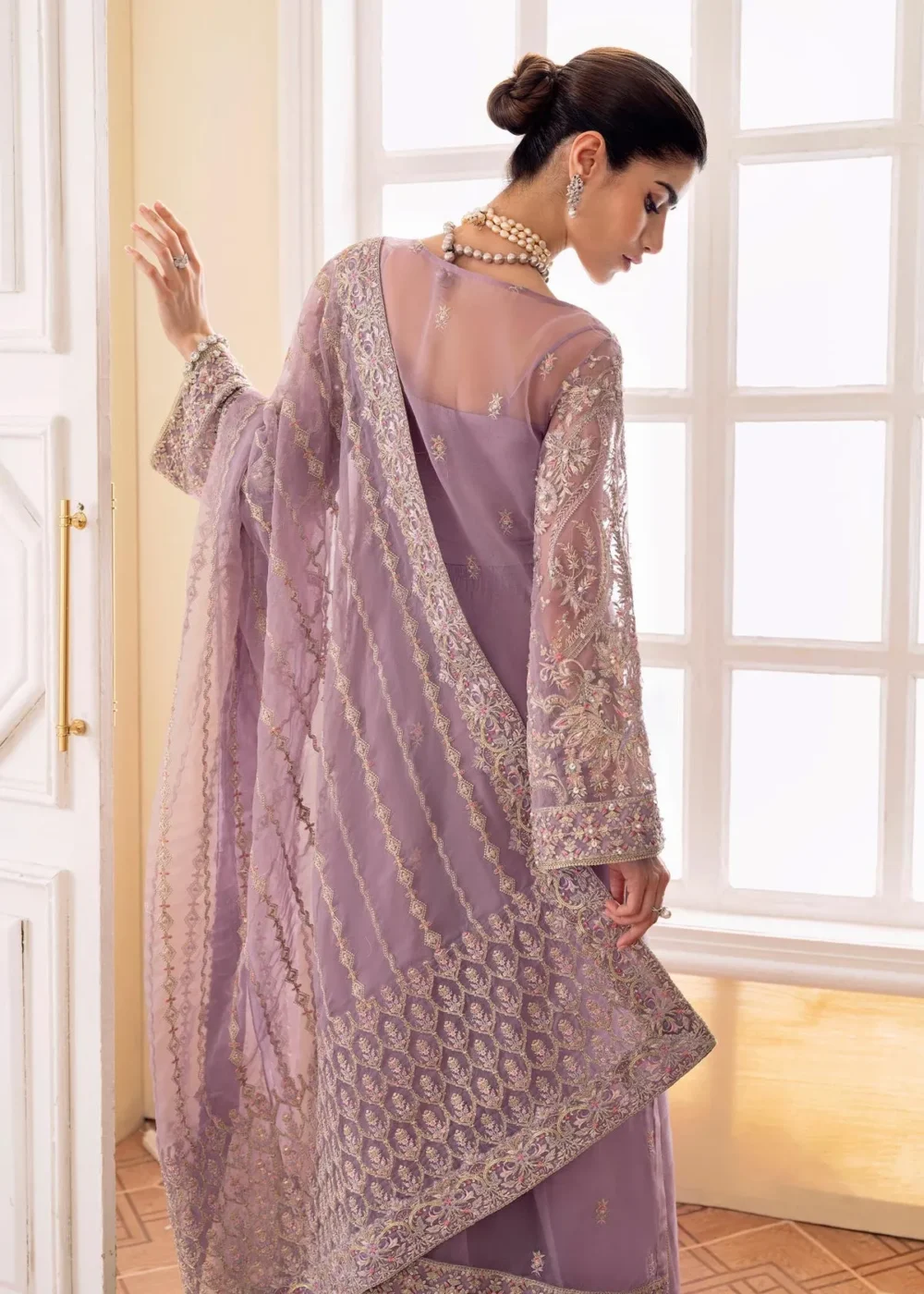 "Lilac Organza front open gown with intricate embroidery and sequins"