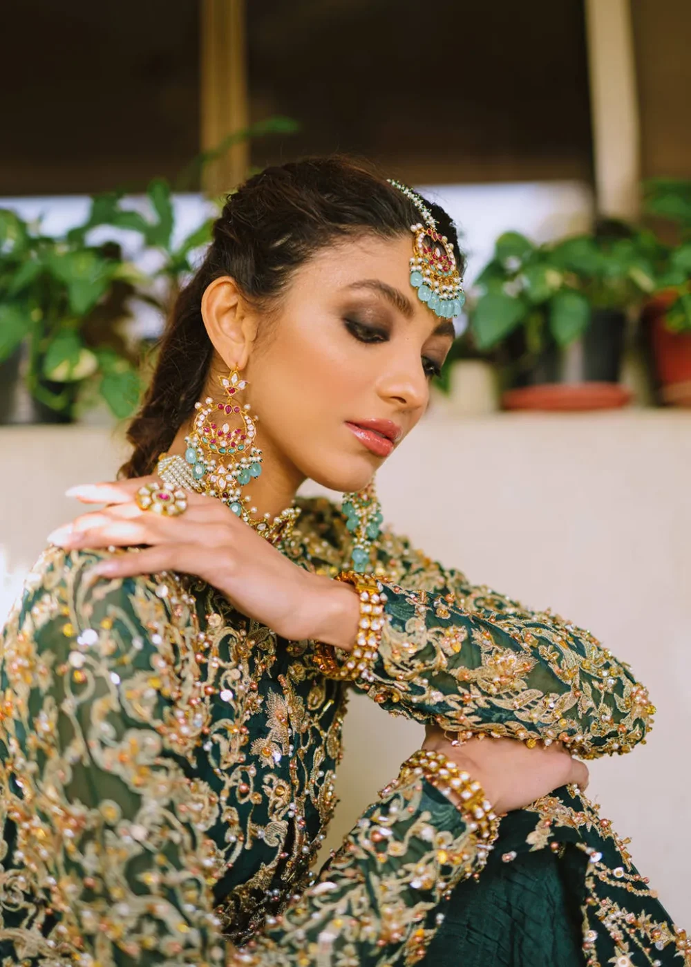 "Shabnami Bottle Green Organza Dress with Floral Motifs and Gold Embellishments"