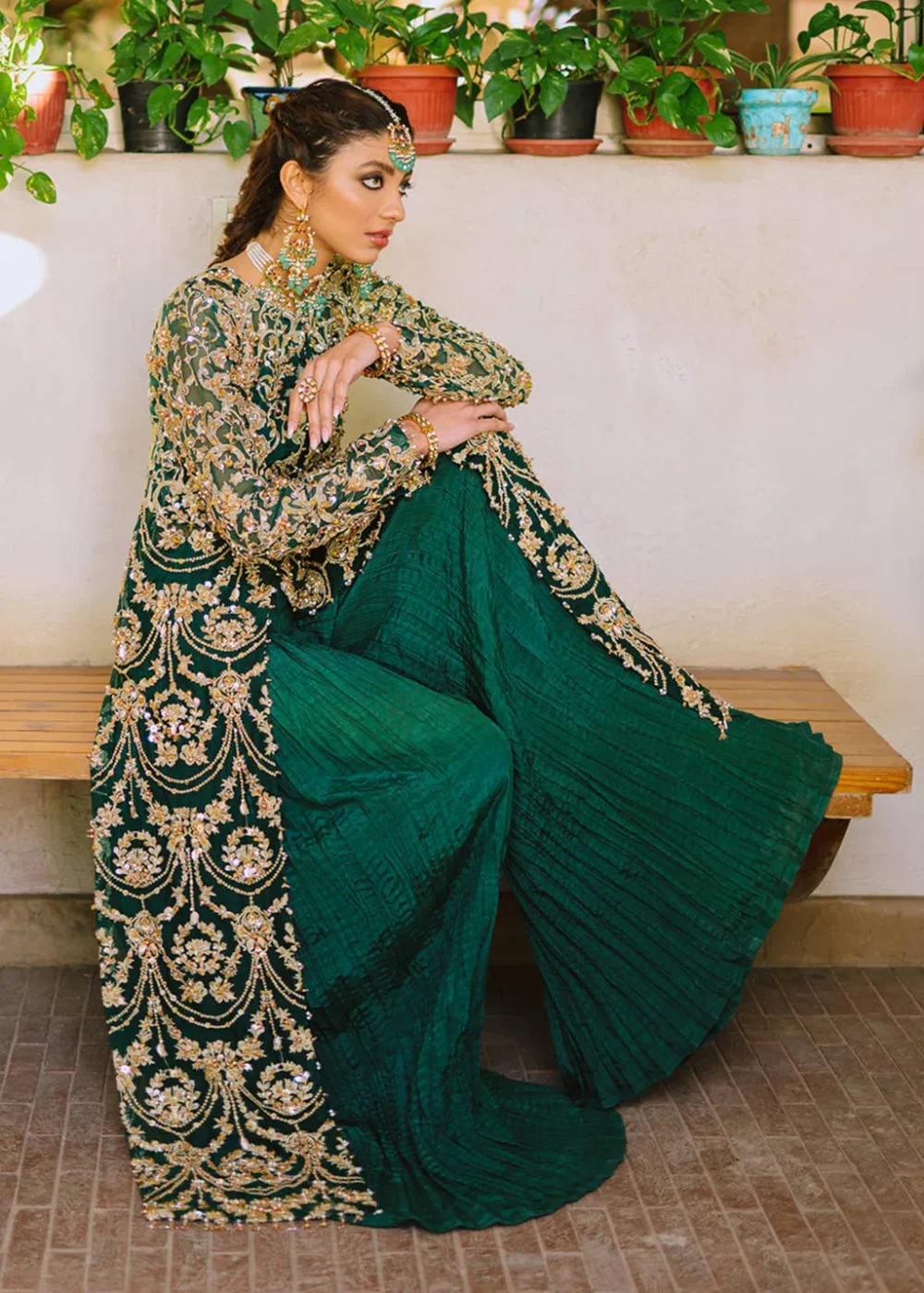 "Shabnami Bottle Green Organza Dress with Floral Motifs and Gold Embellishments"