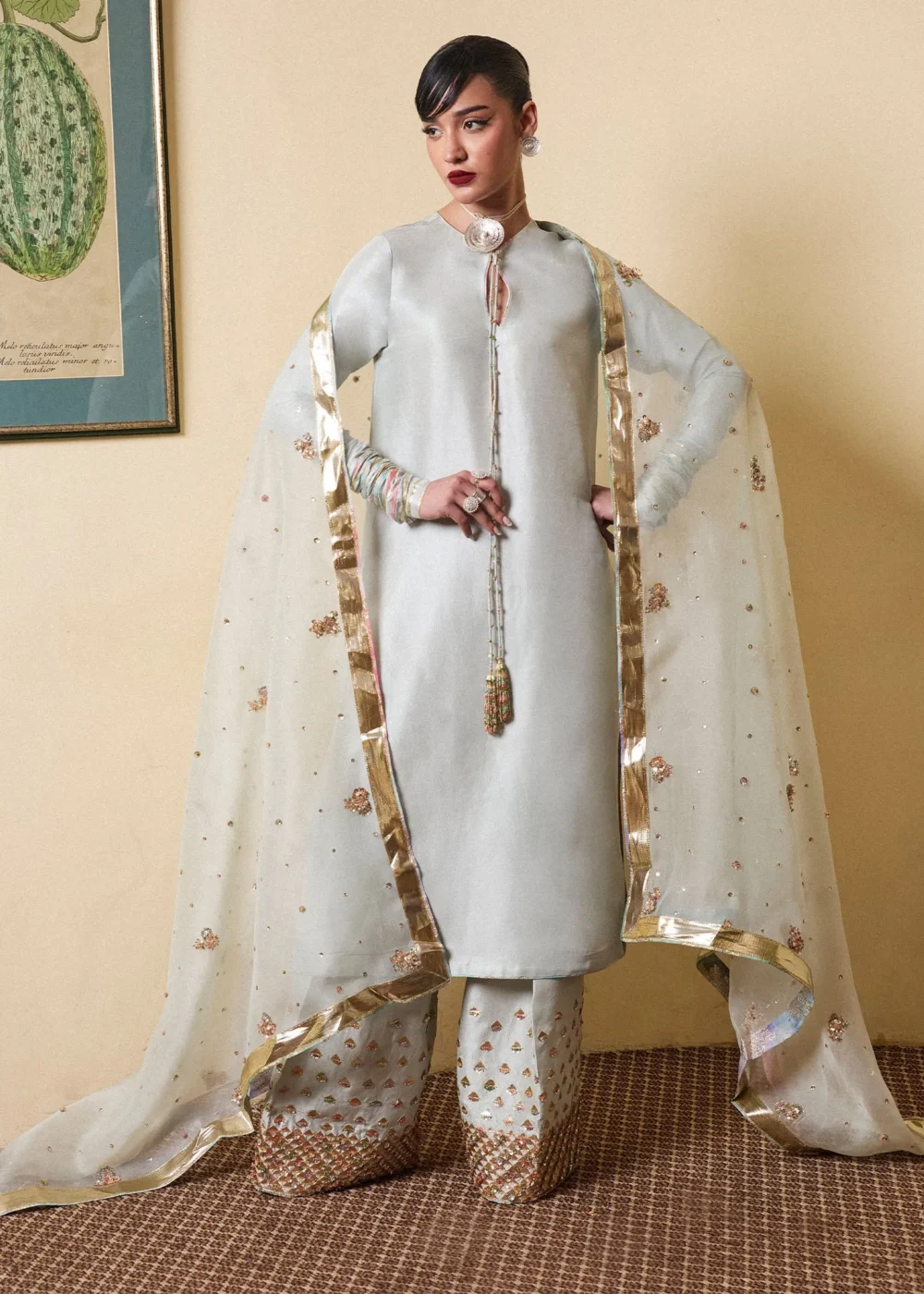 "Ice Blue Long Shirt with Choridar Sleeves and Intricate Embellishments"
